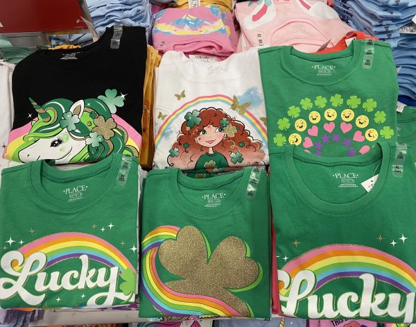 Irish graphic tees on display at a children's store inside shopping mall.